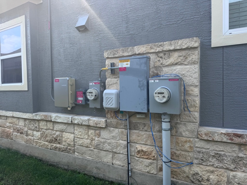 Solar inverter and electrical equipment on exterior wall