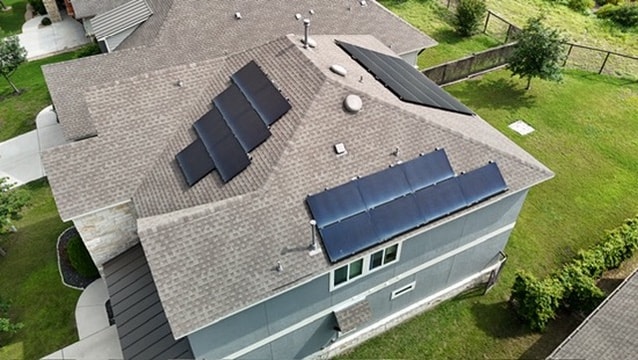 Aerial view of solar panels on a residential rooftop